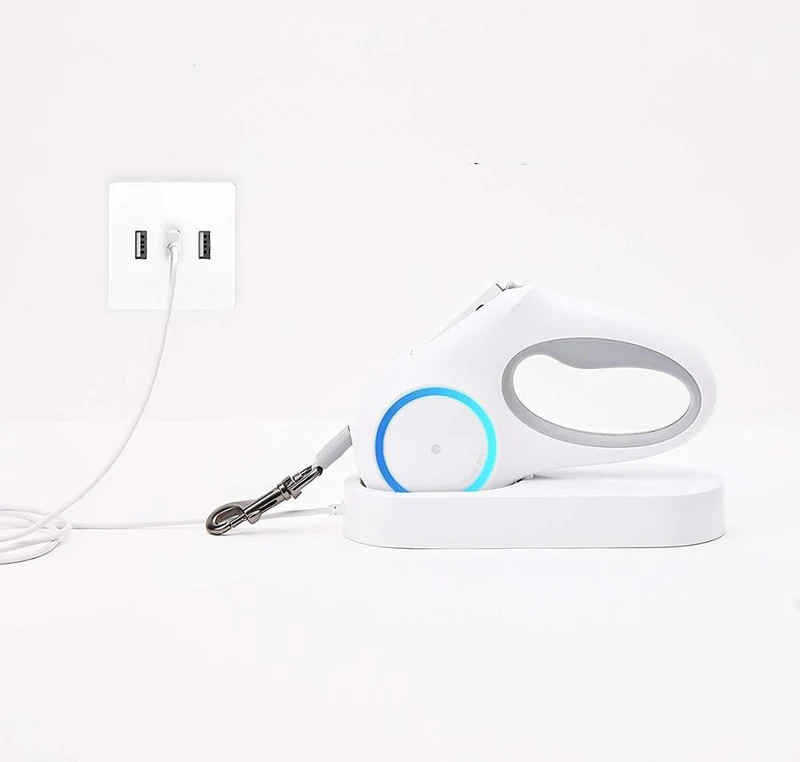 Premium White Retractable Dog Leash on charging dock